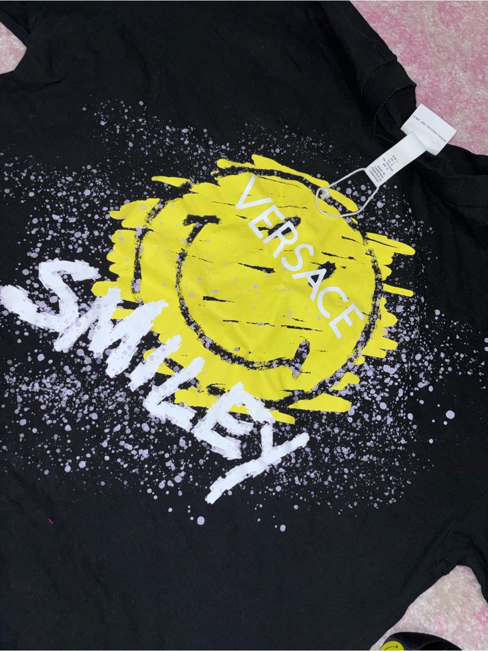 Black T-Shirt with Yellow Smile Graphic